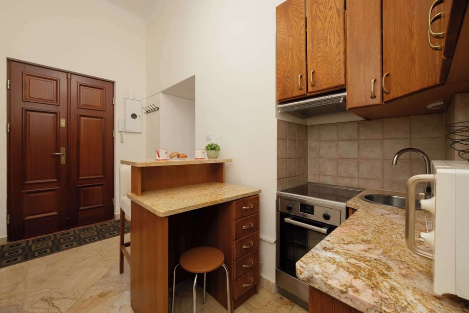 The kitchen is fully equipped with all necessary appliances and utensils.