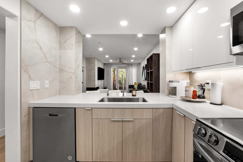 Spacious kitchen opens into the living area, ideal for cooking and connection