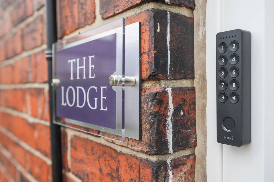 The Lodge door plaque and keypad for smart lock