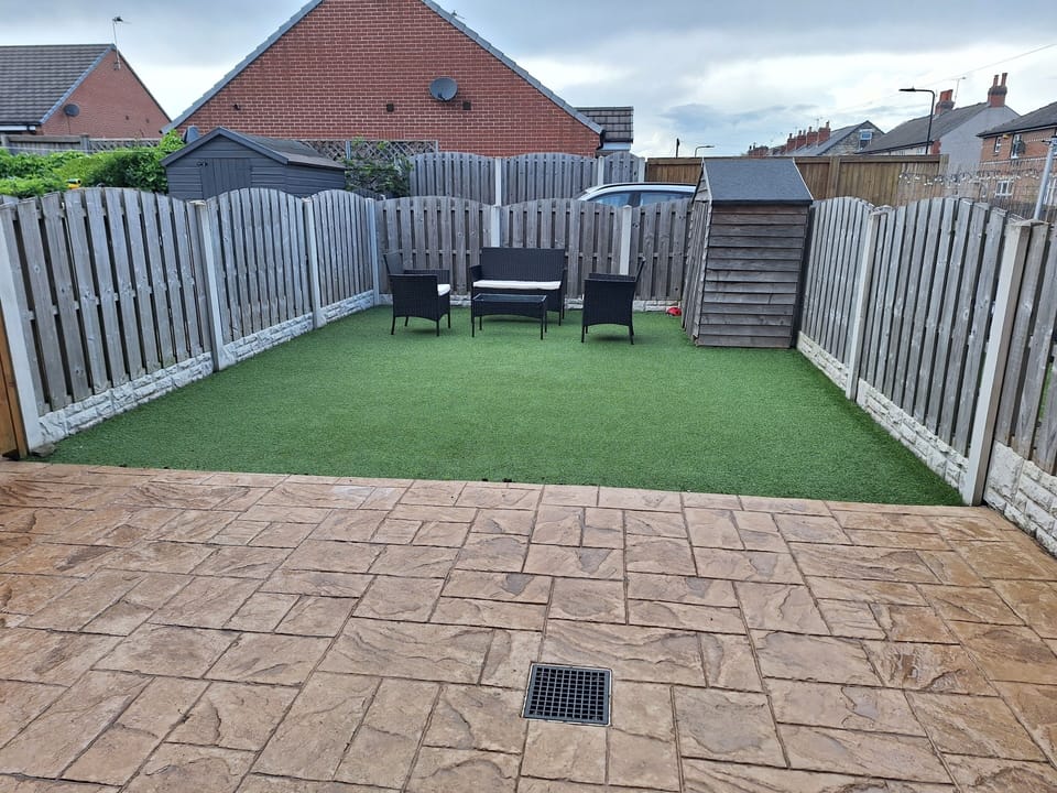 Outdoor seating in rear garden / patio area (artificial grass)