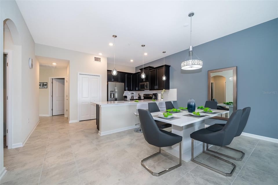 Dining area designed for connection and comfort — the centerpiece of your Orlando stay.