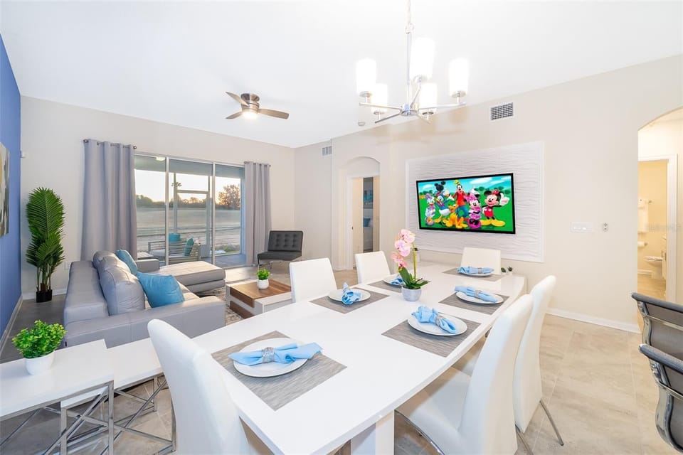 Spacious living room with plush sofas and natural light — relax after Disney adventures in Champions Gate