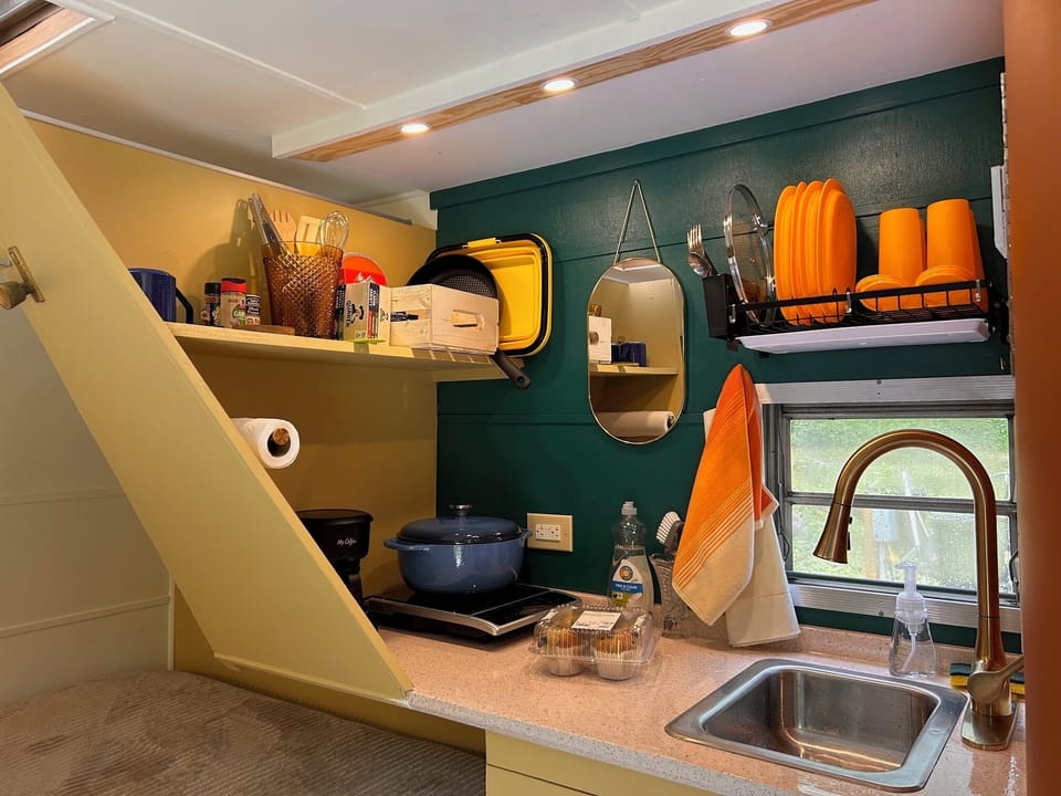 Full kitchen with triple filtered water, cooktop, coffee maker, and more.