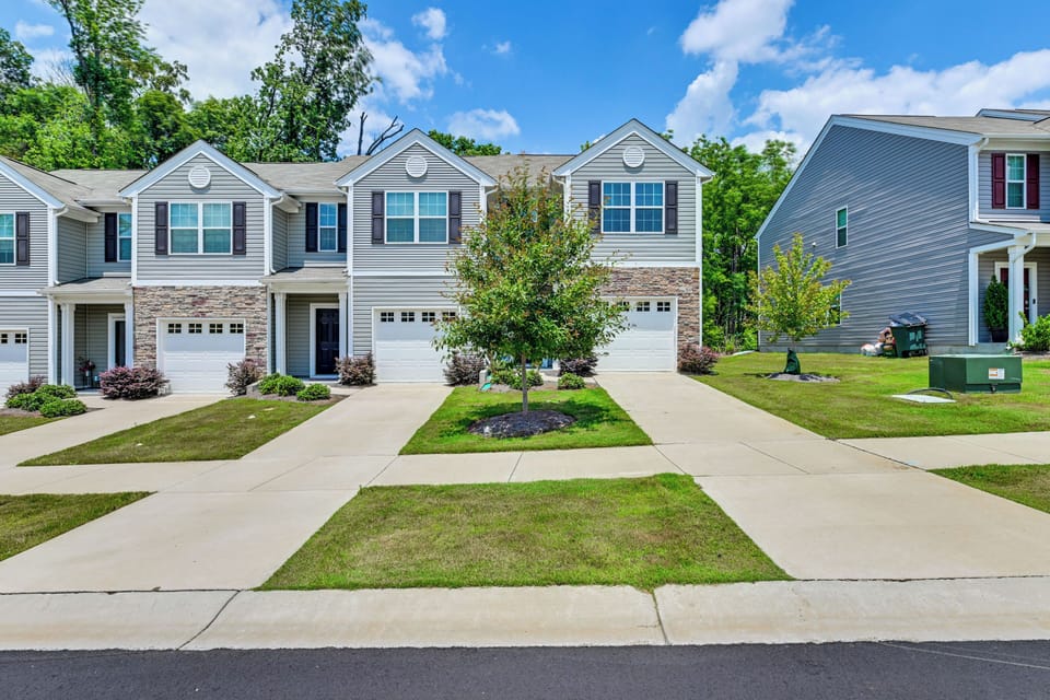 Property Exterior | 2-Story Townhome | Driveway Parking (2 Vehicles)