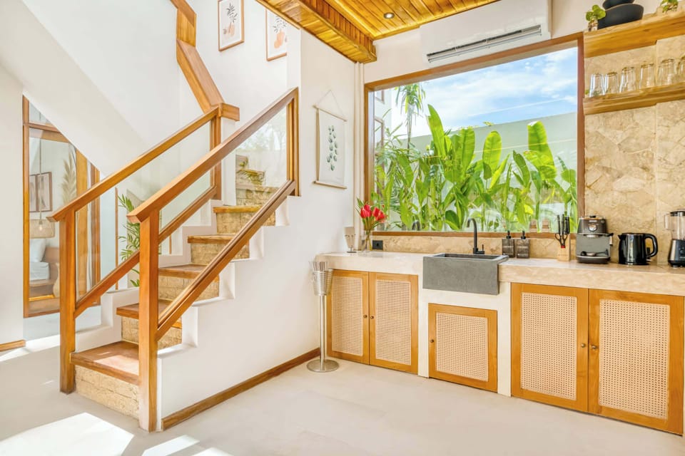 A stylish kitchen with woven cabinetry and natural light, 