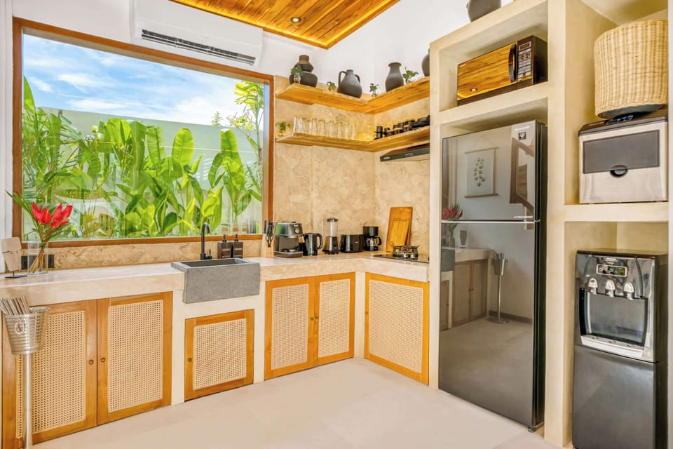 Modern, fully-equipped kitchen thoughtfully designed to provide all you need for effortless meal preparation