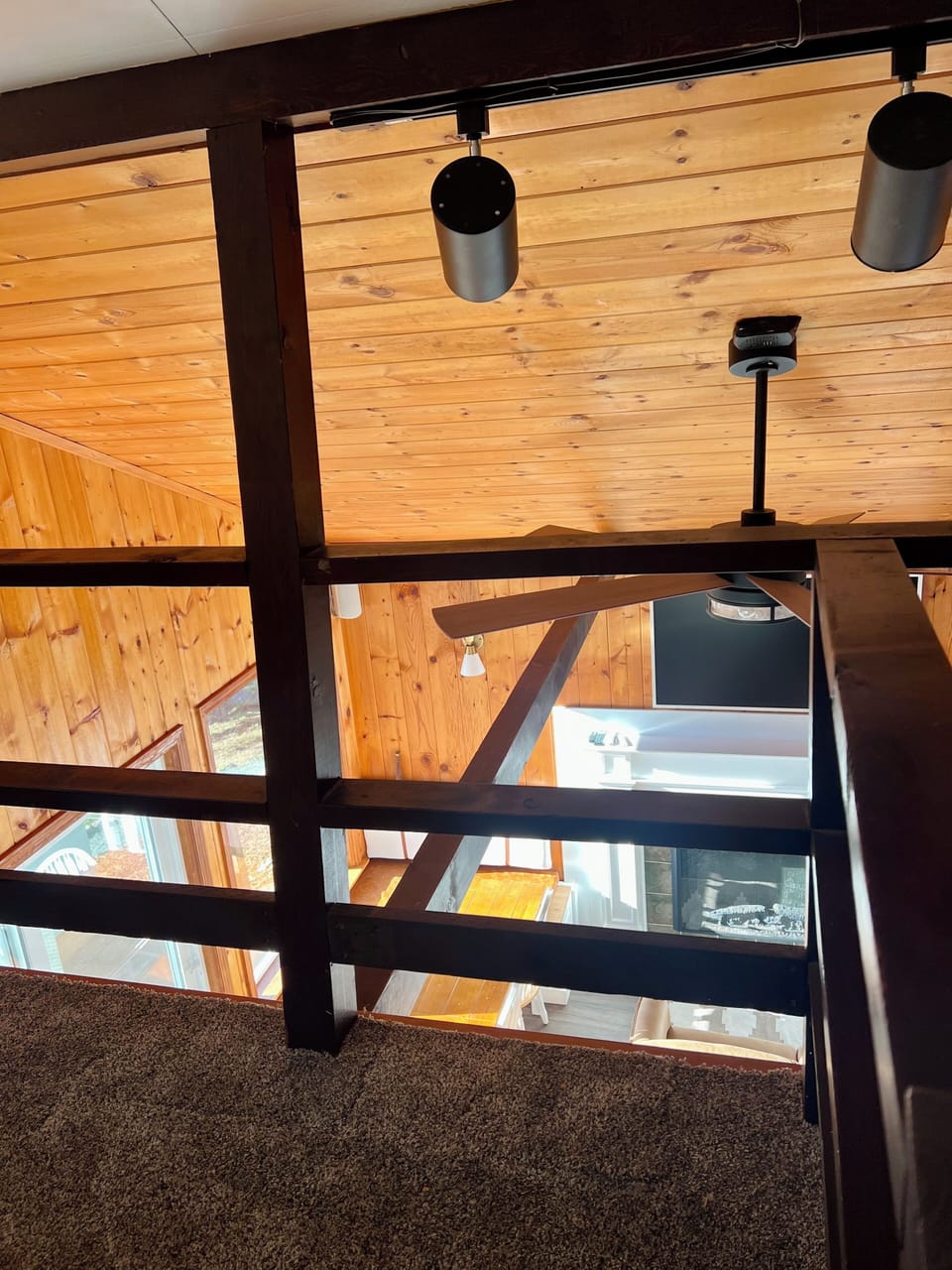 wooden railing in the loft