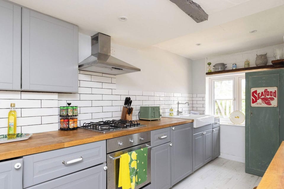 Our fully equipped kitchen features modern amenities and has everything you need.