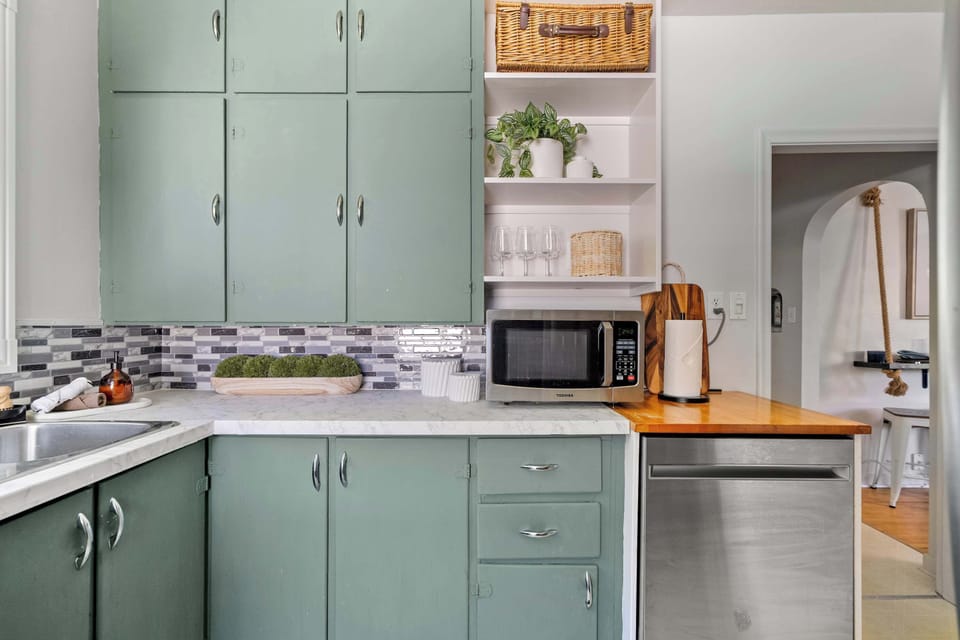 Fully stocked kitchen with microwave