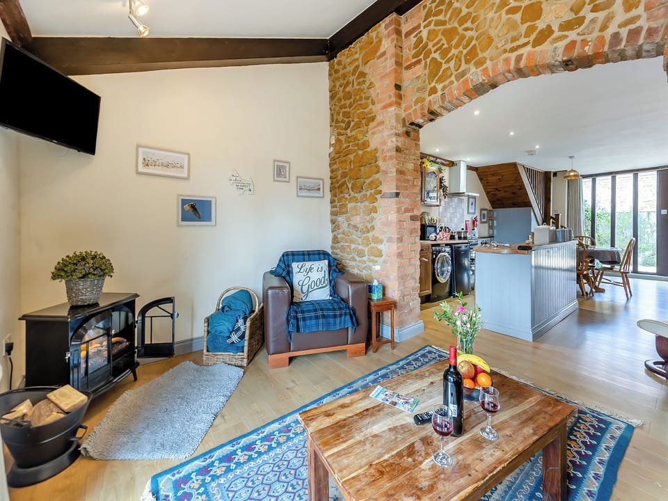 Open plan living space | The Old Barn - Norfolk Coastal Cottages, Heacham, near Hunstanton