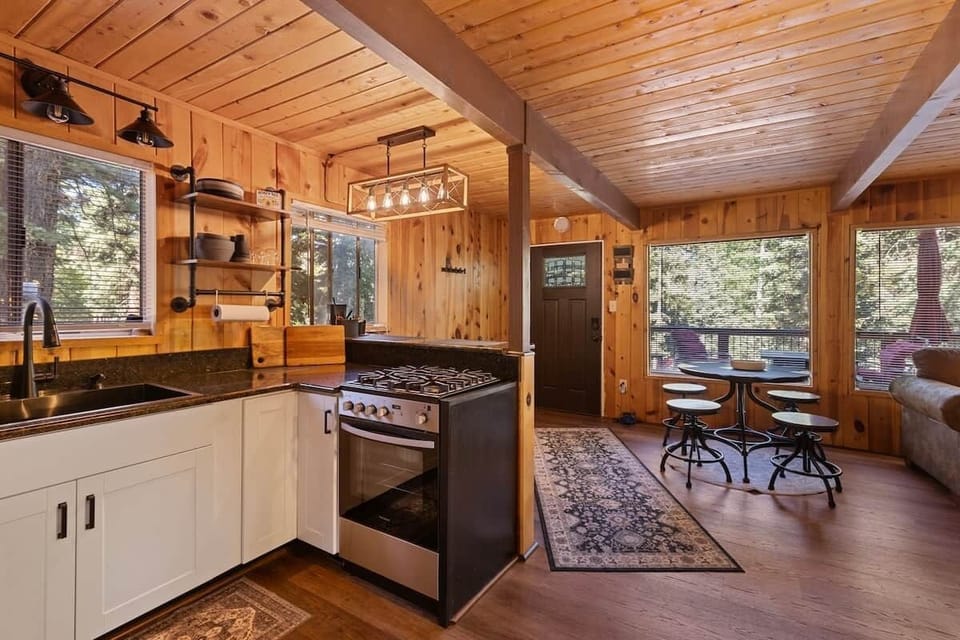 I tried to think of everything, utensils, pots, pans, cutting boards, wine glasses, dishes, Keurig, Ninja Bullet, Ninja Air Fryer, salt and pepper grinder. The stove is a 24 inch stove.
The table and chairs can be made into bar height if you prefer.