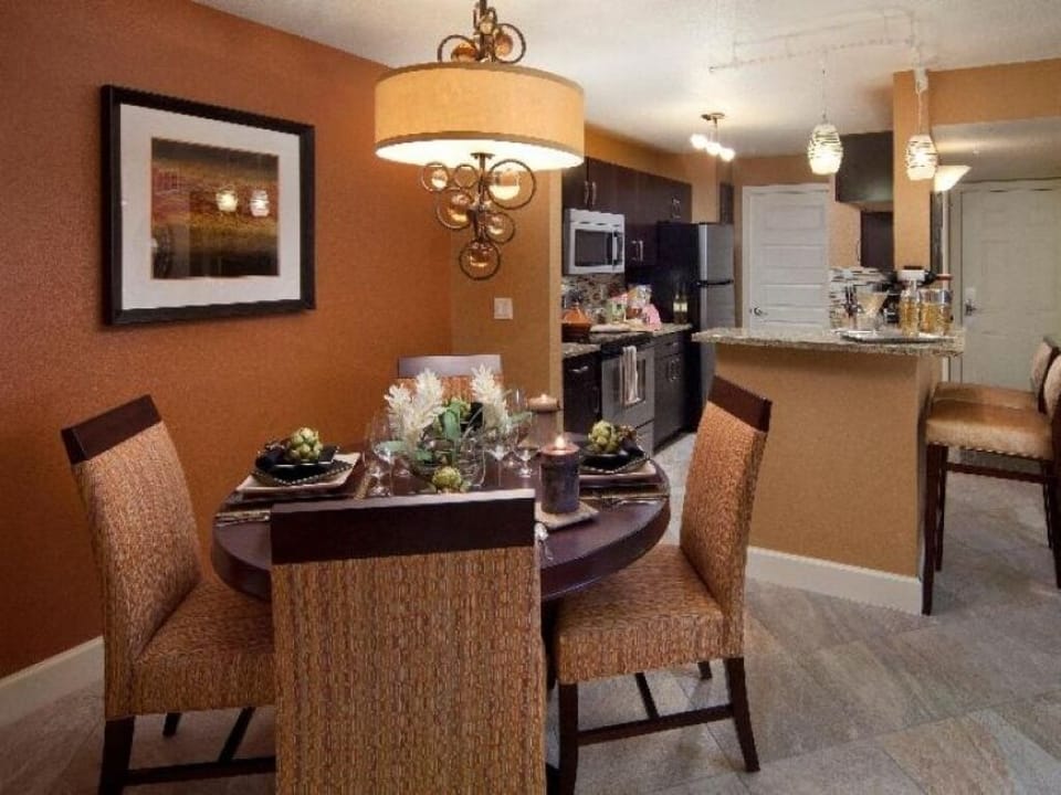 Gather for cozy dinners under warm, inviting lighting.