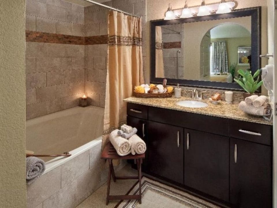 Refresh in a spa-like bath with plush towel touches.