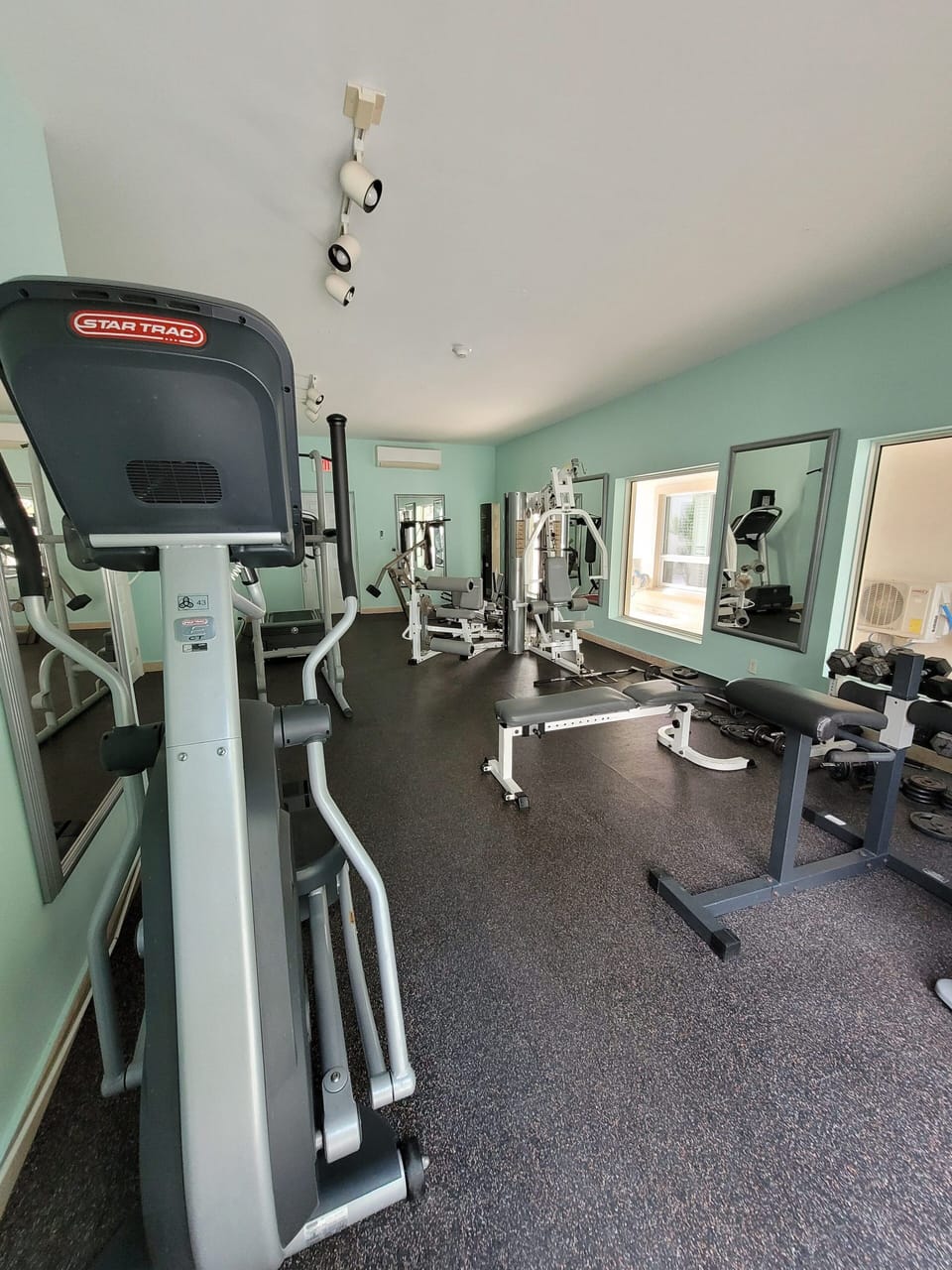 The gym is on the ground floor across from the unit.