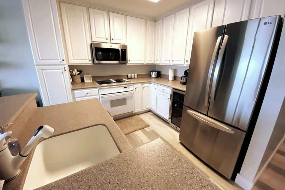 Fully equipped kitchen. Including a mini beverage fridge and combo Keurig/coffee maker. 