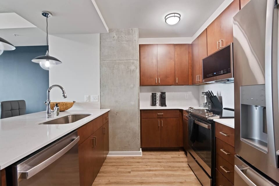 Welcome to our fully equipped kitchen, where every culinary need is met. Complete with modern appliances, ample counter space, and all necessary utensils, cooking here is a pleasure. Enjoy preparing meals with ease and convenience.