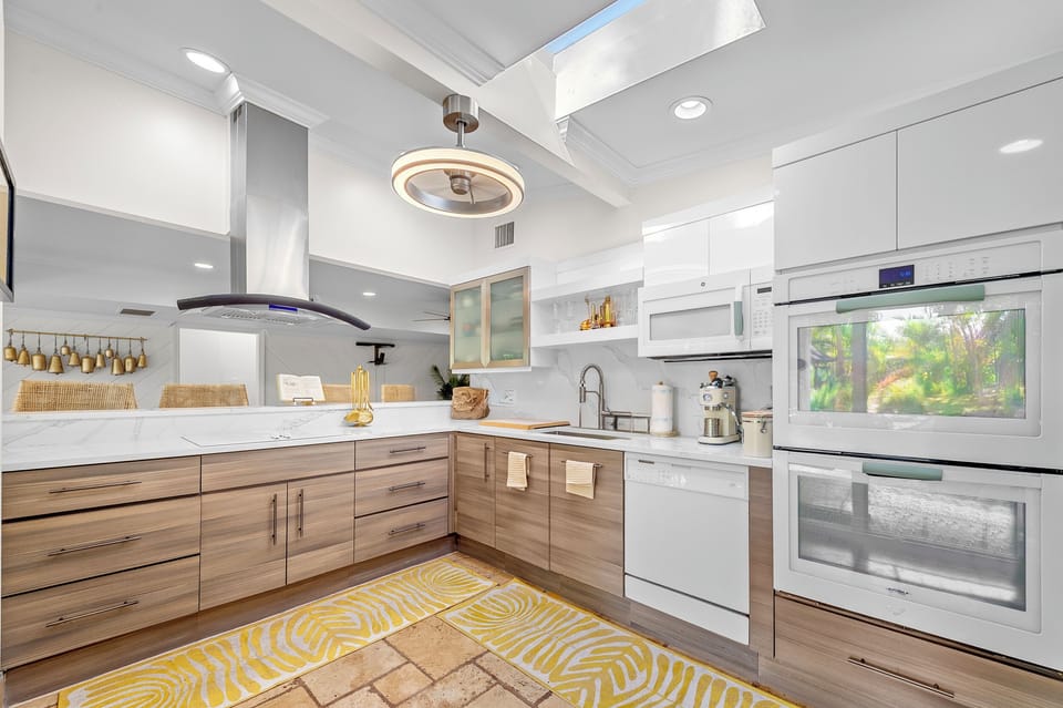 Cook like a pro in a modern kitchen with sleek cabinetry, stainless steel appliances, and a spacious island—designed for both function and style.
