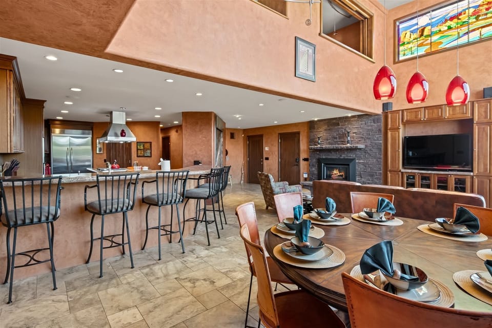 Dining table and bar seating for all your guests
