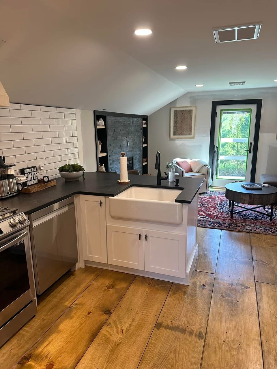 Full kitchen with microwave, oven, stove top, dishwasher, fridge and freezer