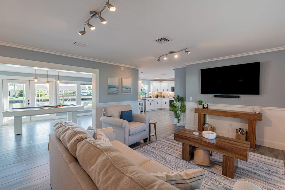 A stylish modern living room with warm wood accents.