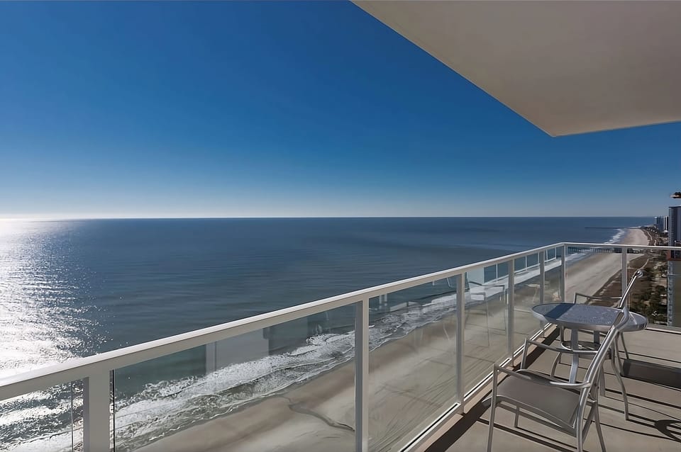 Soak in endless ocean views with breezy balcony seating.
