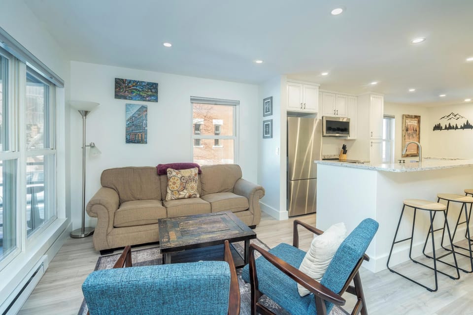 Living Room - Open concept floor plan with living room seating for 4