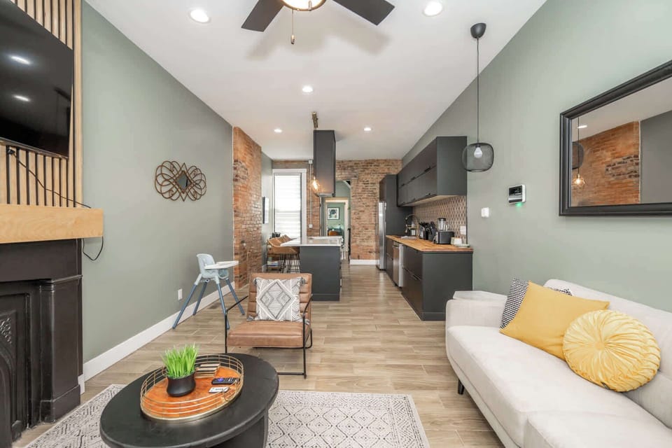 Curl up in the chic living room & stream your favorites on the smart TV​