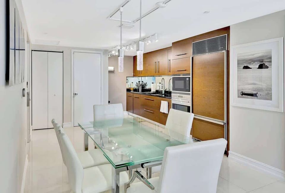 Chic dining space, perfect for a quiet meal, remote work, or a cozy breakfast.