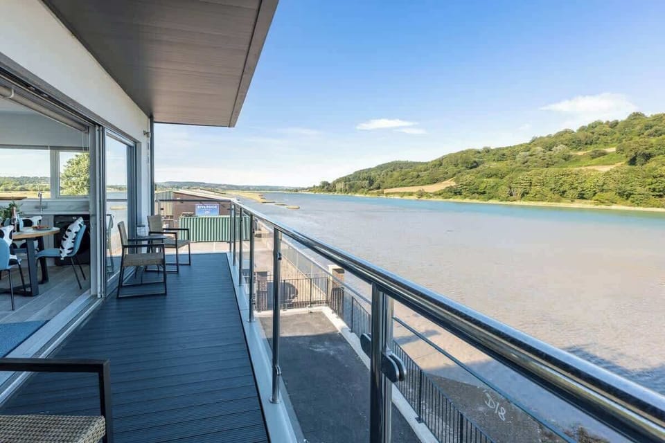 This balcony offers a comfortable space for four – ideal for enjoying a relaxing afternoon tea or an evening glass of wine while taking in the view.