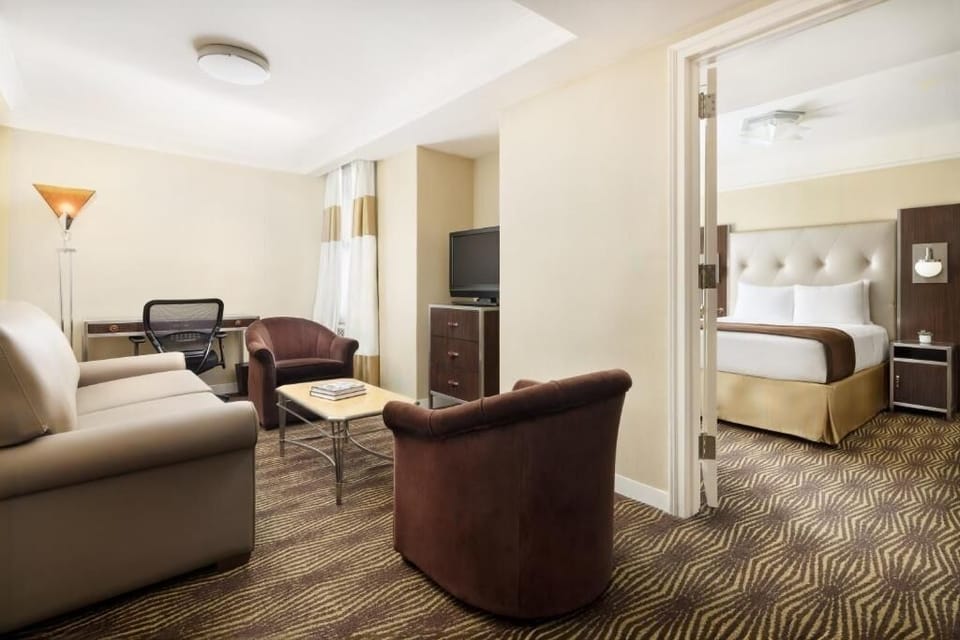 Unwind in a spacious suite with separate lounging area.