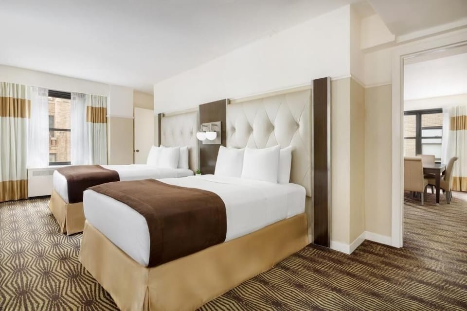 Sink into plush beds and wake up to sunlit city views.
