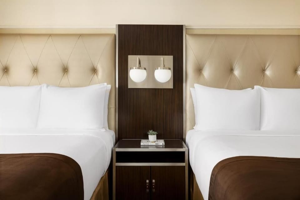 Drift off beneath soft lighting and crisp, hotel-quality linens.
