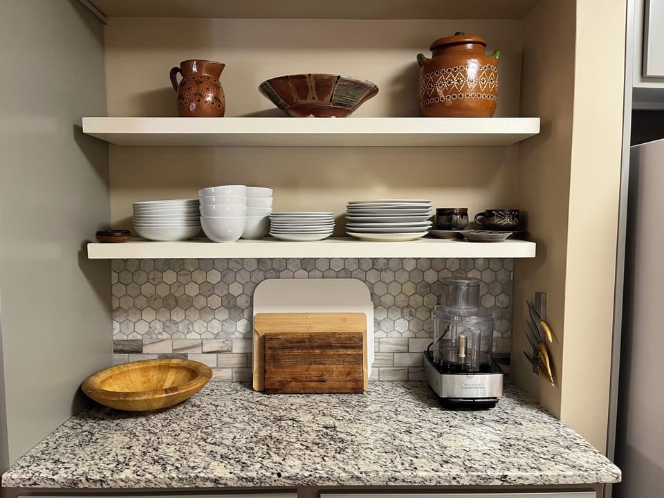 You will find more than you need to cook, including a Cuisinart food processor.