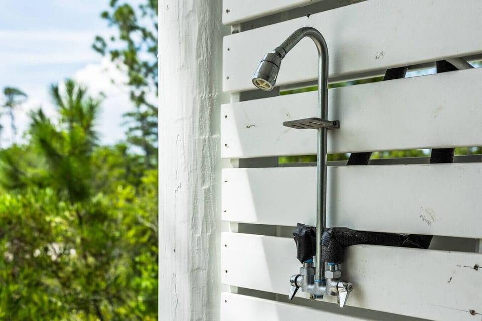 Rinse off the sand in the serene outdoor shower
