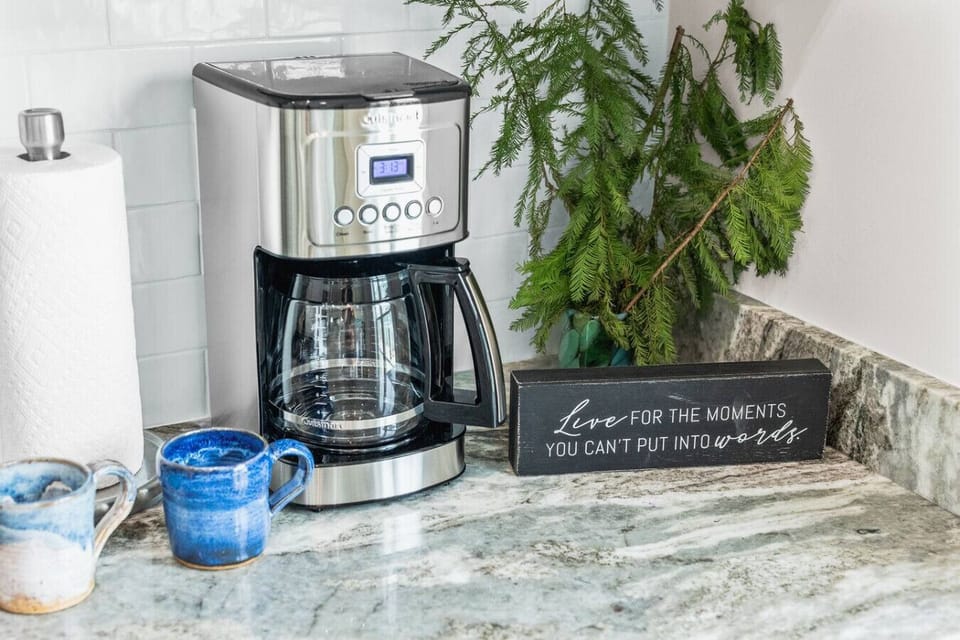 The coffee and tea station includes all the essentials to start your day