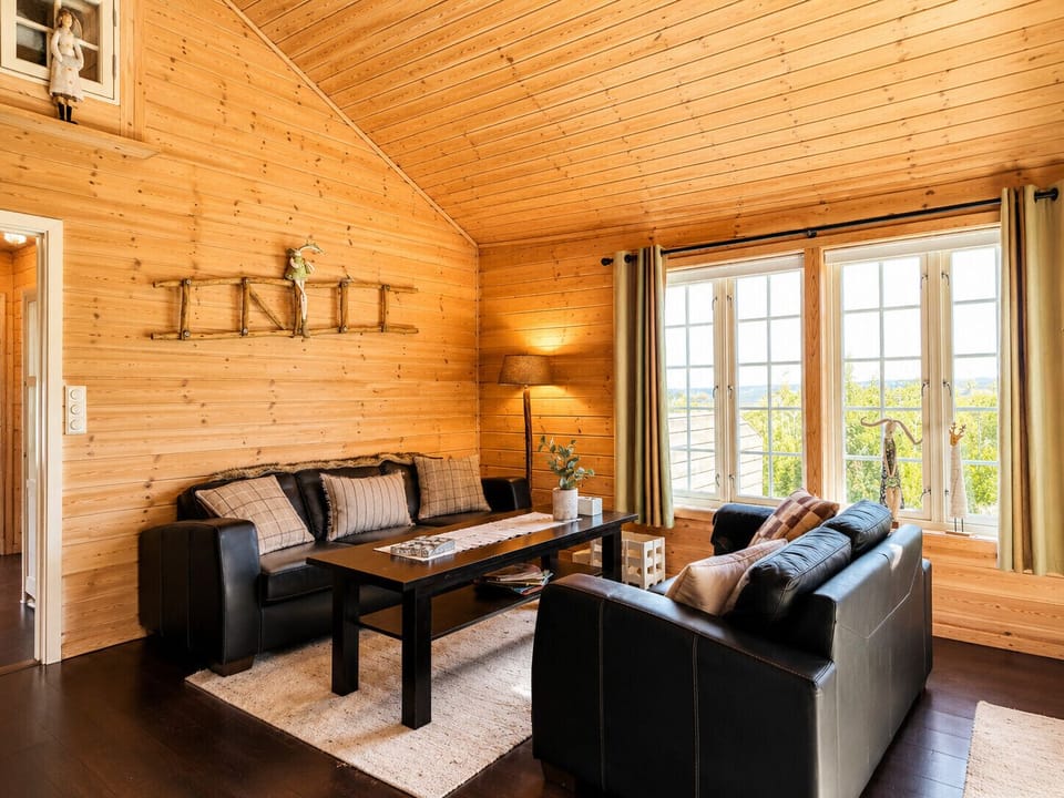 Living room with ample space to relax and fireplace