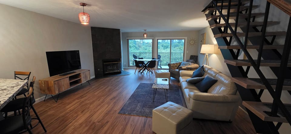 Living room showing stairs leading up to the bedrooms.