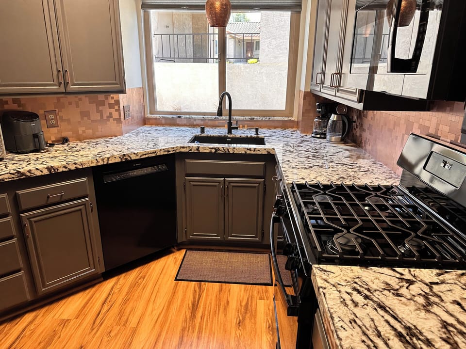 New granite countertops and flooring.