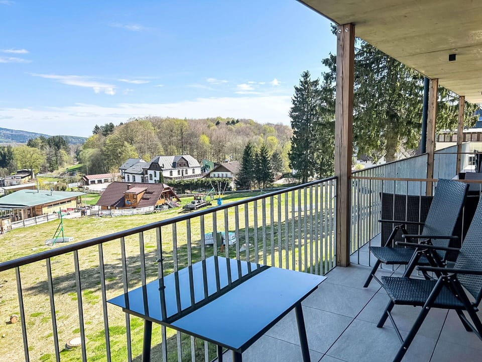 Furniture, Chair, Balcony, Hardwood, Fence, Outdoor Furniture, Handrail, Baluster, Porch, Deck