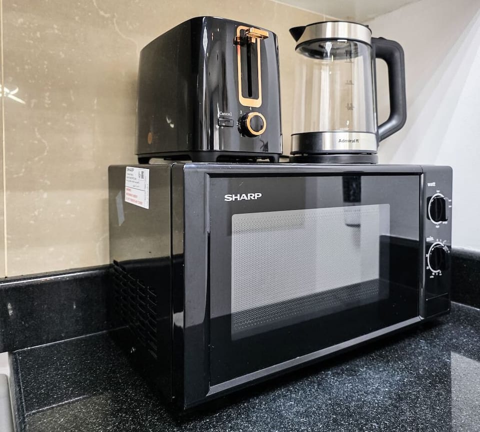 Enjoy the perfect blend of style and functionality in a kitchen stocked with modern appliances and everyday essentials.