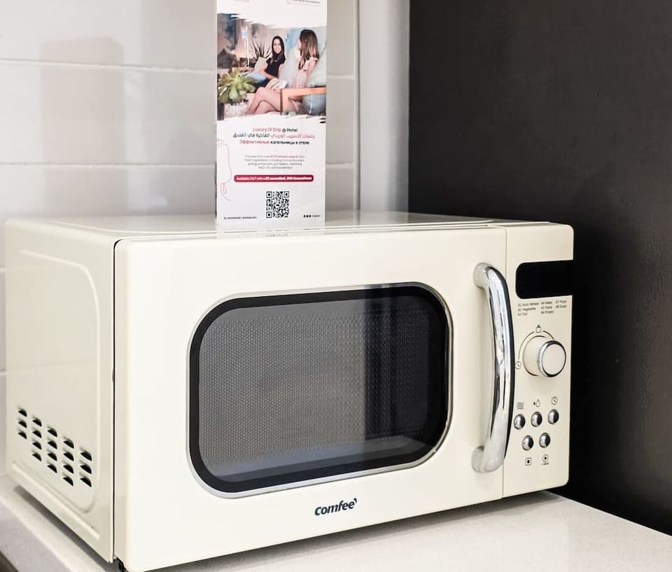 Enjoy the comfort of a fully equipped kitchen where modern convenience meets timeless design.
