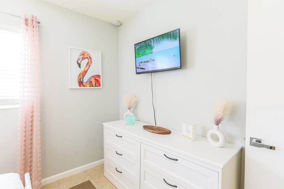 Whether you're winding down after a beach day or catching up on a good book, this bedroom offers a quiet retreat with everything you need to recharge.