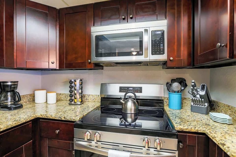 Start your mornings right with the dedicated coffee corner, featuring a drip coffee maker and all the essentials for your favorite morning brew—ideal for early risers and caffeine lovers.