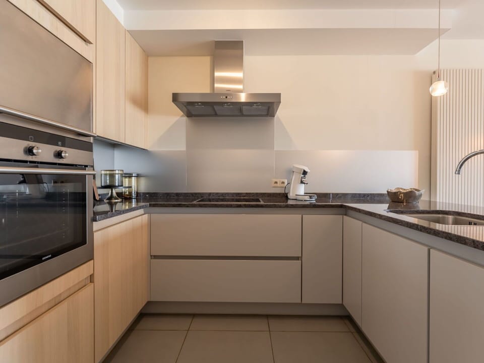 Kitchen, Kitchen Appliance, Countertop, Interior Design, Major Appliance, Cabinetry, Wood, Kitchen Stove, Home Appliance, Flooring