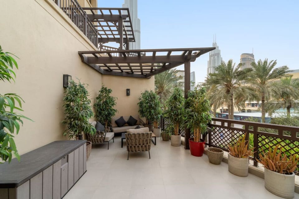 Spacious Balcony : Unwind with stunning skyline views and lush greenery!