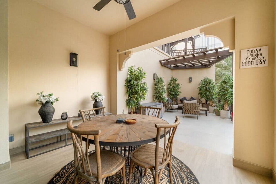 Dining Room: Enjoy delightful meals under a charming canopy, surrounded by vibrant greenery!