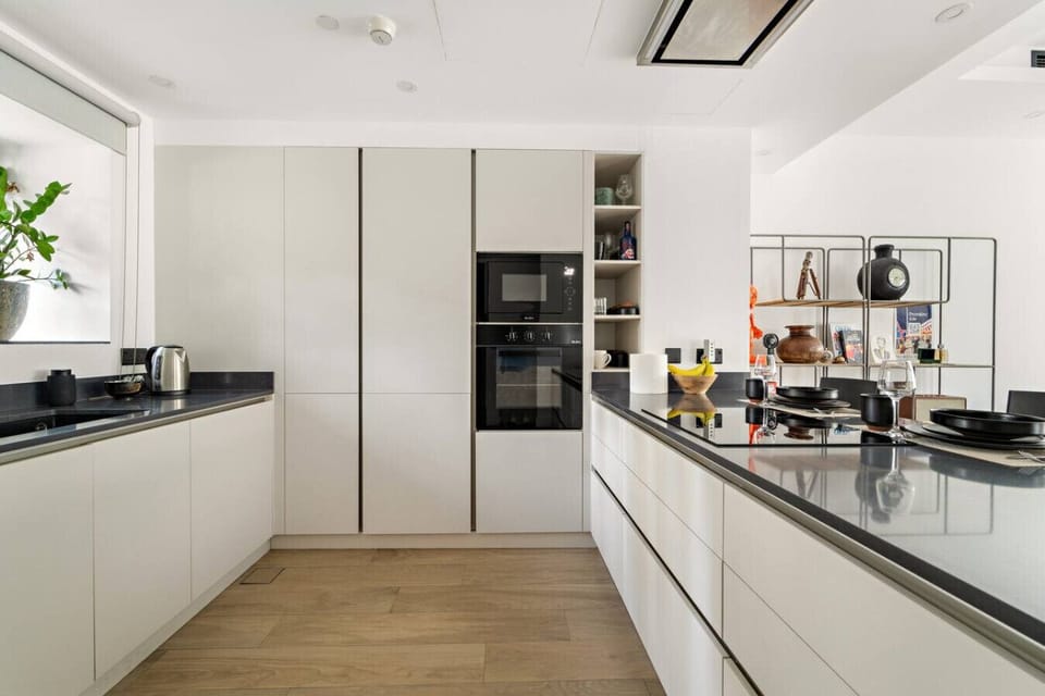 Gourmet Kitchen: Experience culinary bliss in this sleek, modern kitchen with stylish finishes!