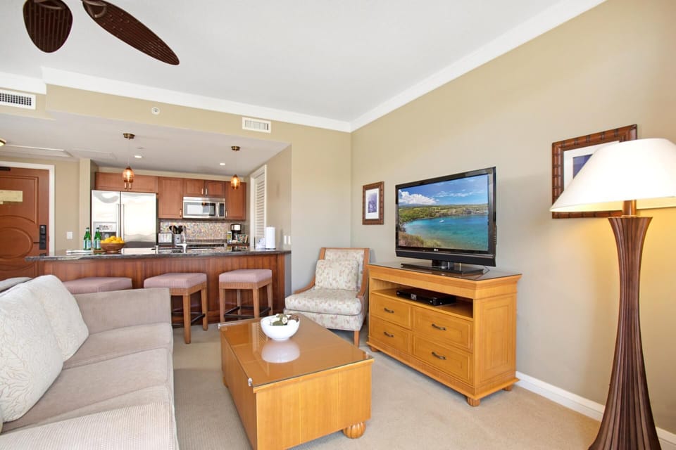 Relax after a day on the beach in the inviting living space with tropical decor touches HKH-516