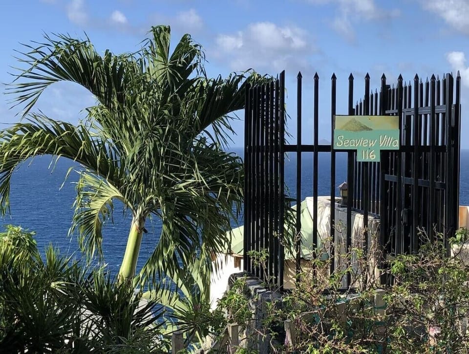 Entrance gate and Seaview Villa sign
