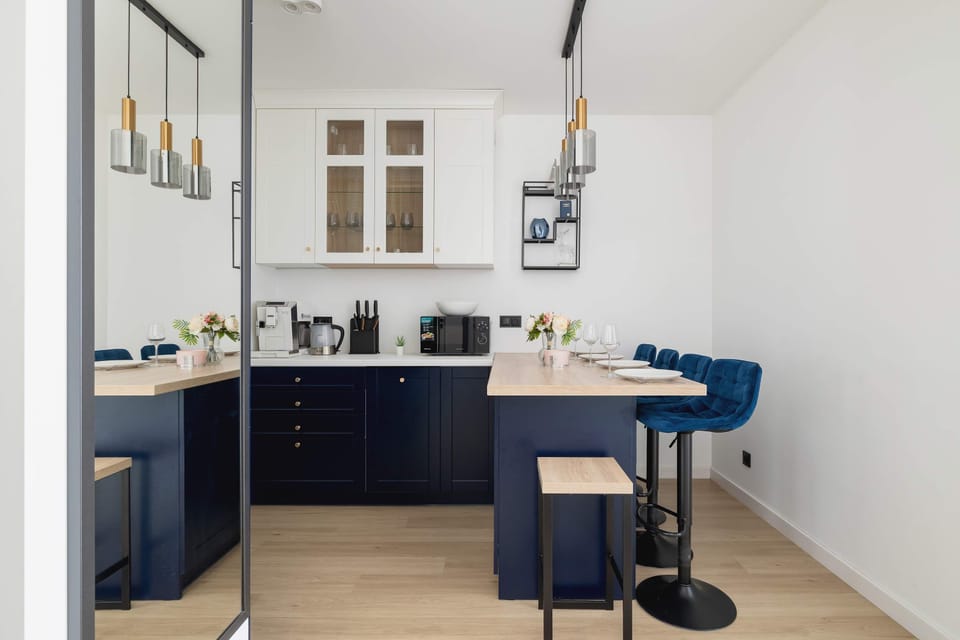 Fully equipped kitchenette with dining area.